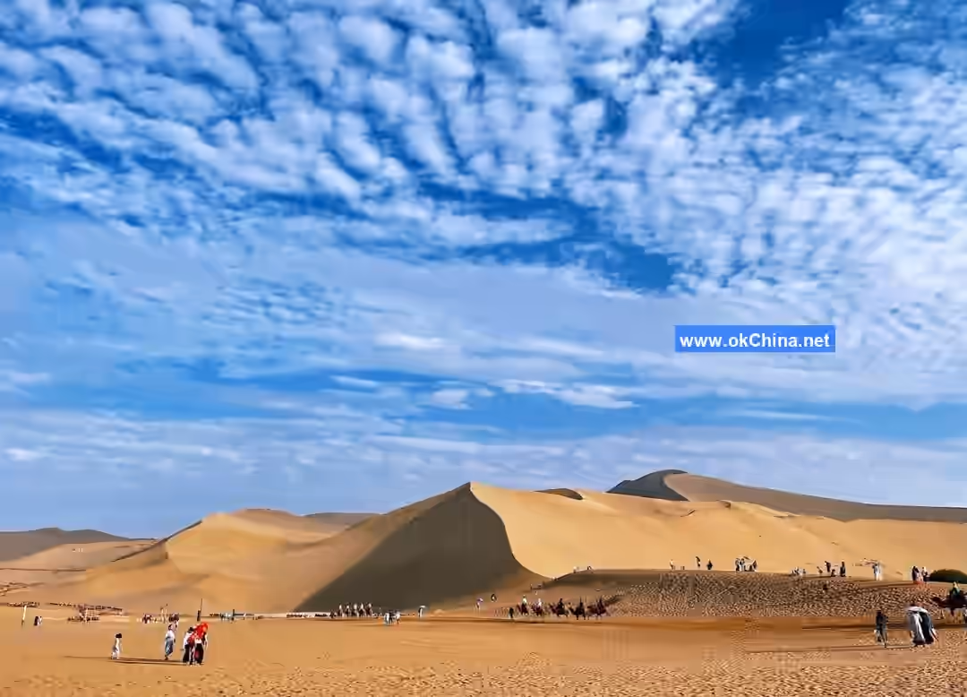 Mingshashan Mountain And Crescent Moon Shaped Spring Scenic Area